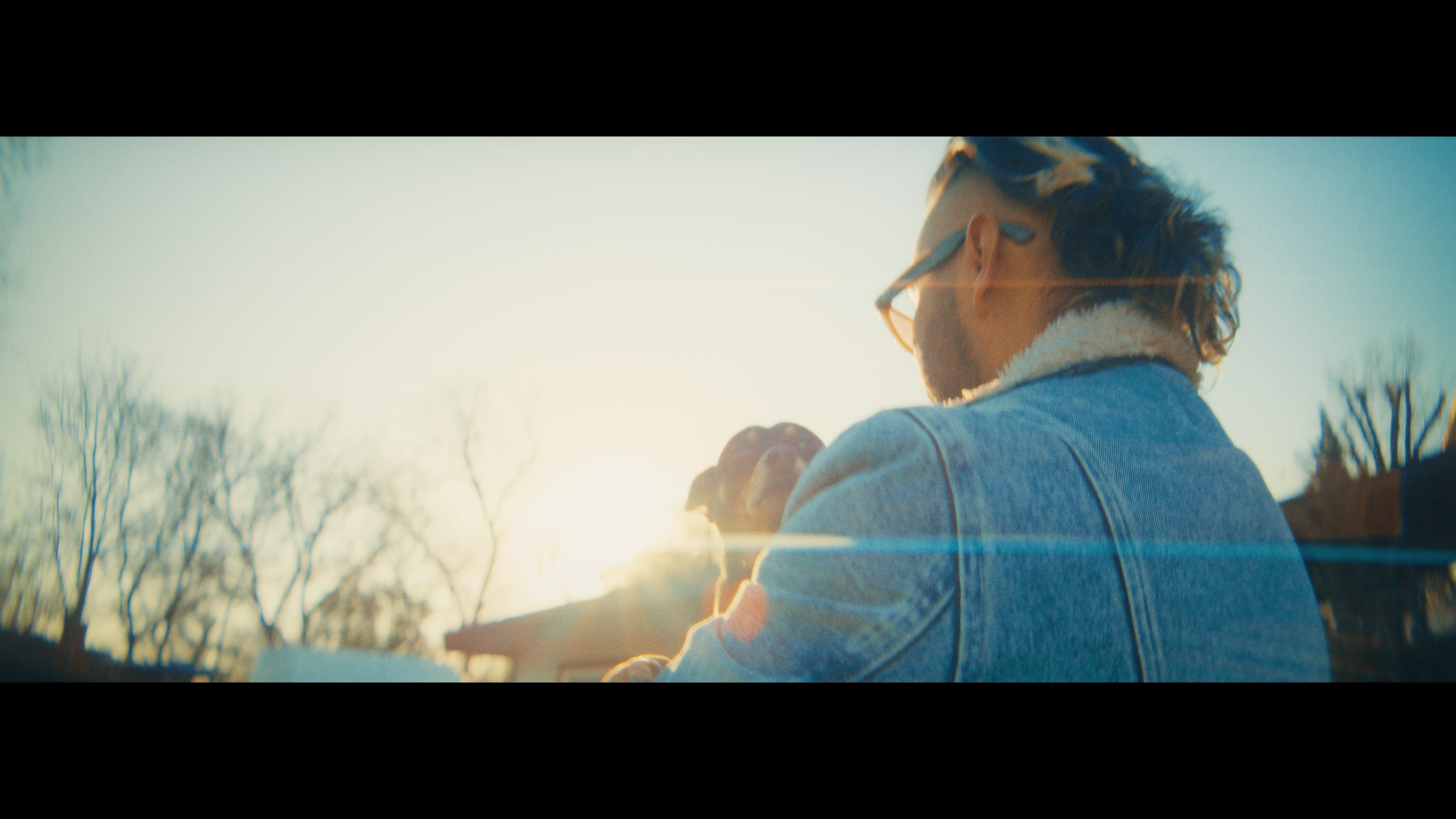 Daniel Polito behind the camera at golden hour, shooting on location